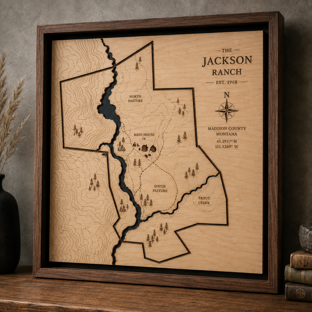 Framed engraved wooden property map of a Montana ranch with contours and named pastures